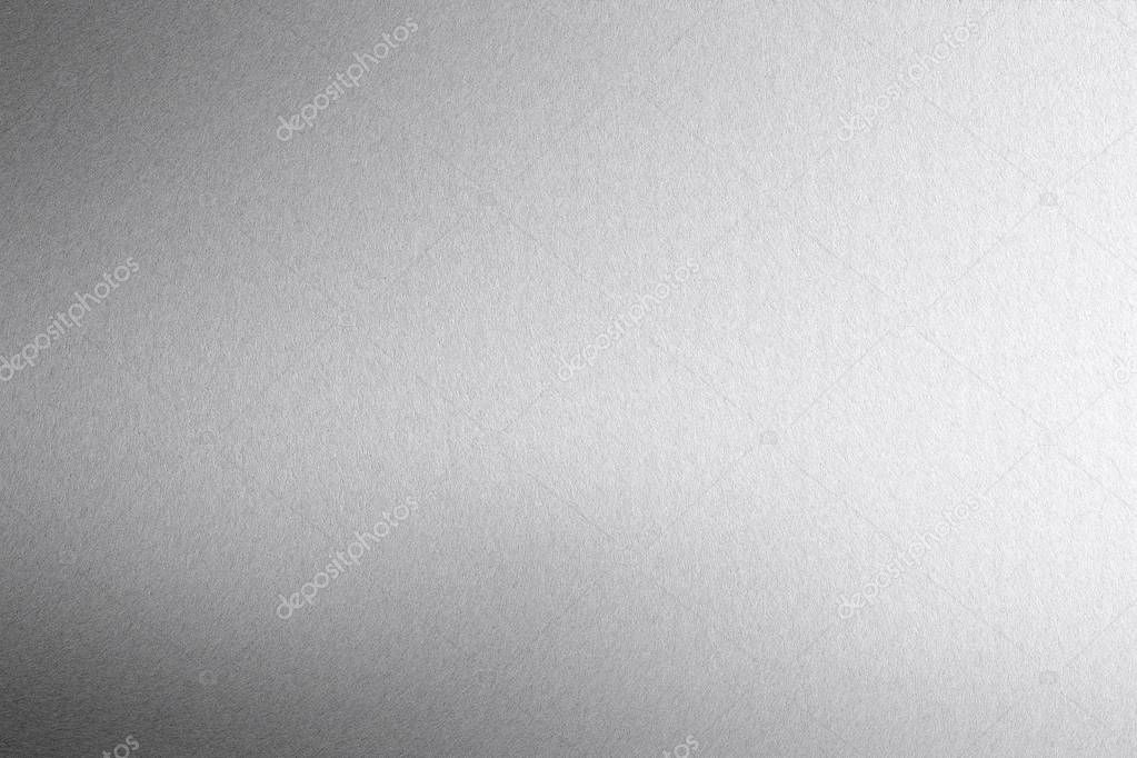 Texture of reflection on rough light gray steel sheet, abstract background