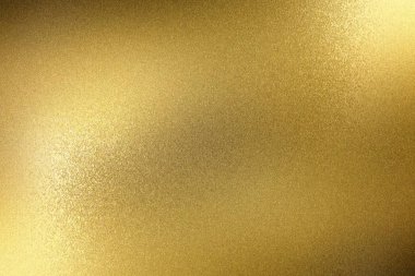 Kaba altın metal panelde parlayan ışık, soyut doku arka planı