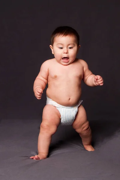 Cute Happy Funny Babyfirst Steps Walking While Wearing Diaper Gray — Stock Photo, Image