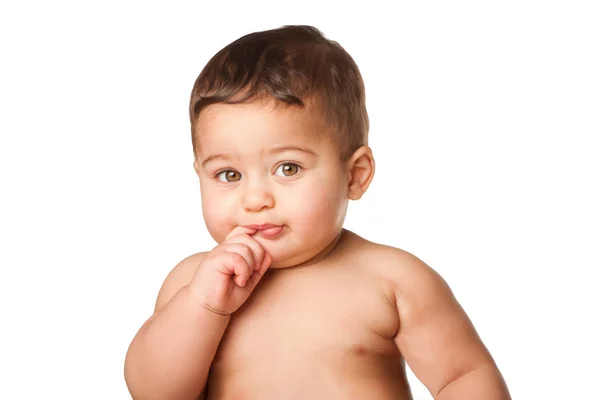 Cute baby infant with big green eyes finger in mouth on white — Stock Photo, Image