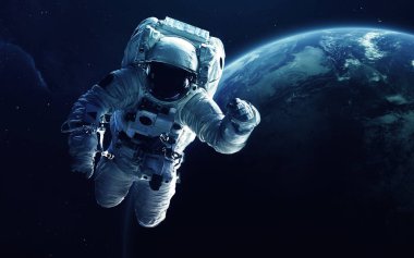 Dünya gezegeninin önünde astronot. Nasa tarafından döşenmiş bu görüntünün elemanları