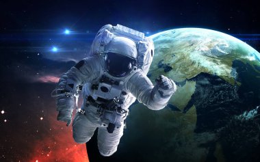 Astronot uzayda. Uzay yürüyüşü. Nasa tarafından döşenmiş bu görüntü unsurları