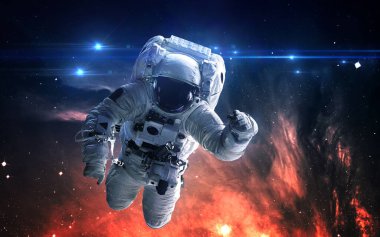 Astronot uzayda. Uzay yürüyüşü. Nasa tarafından döşenmiş bu görüntü unsurları