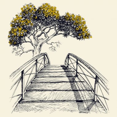 Wooden bridge arch, blooming tree in the background