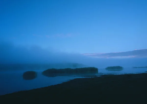 beautiful view of foggy lake