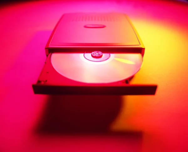 Latar Belakang Berwarna Dengan Perangkat Digital Pendekatan Rom Dengan Disk — Stok Foto
