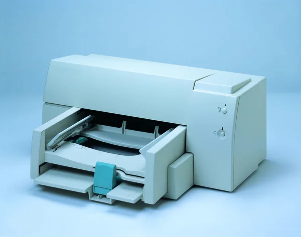Closeup of computer printer, digital world concept
