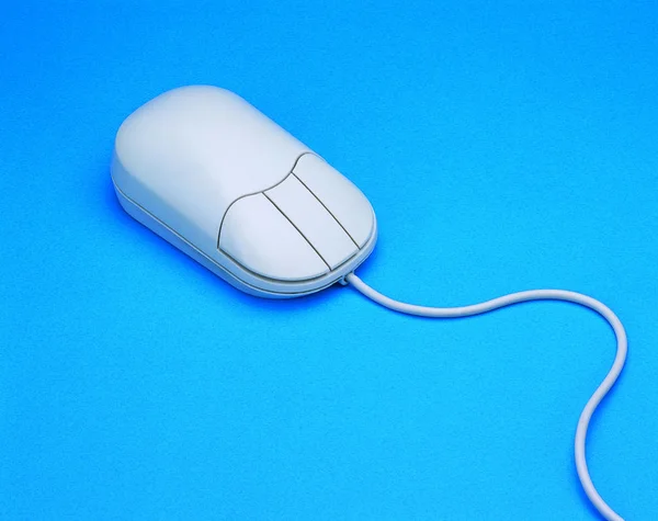 テクスチャの背景上のコンピュータ マウス — ストック写真