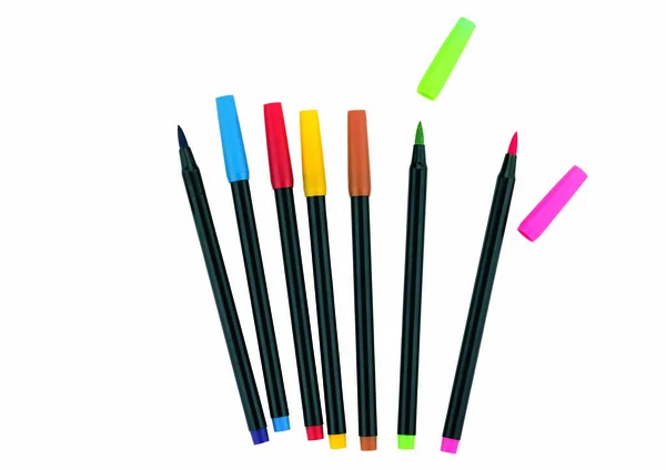 colored markers on white background