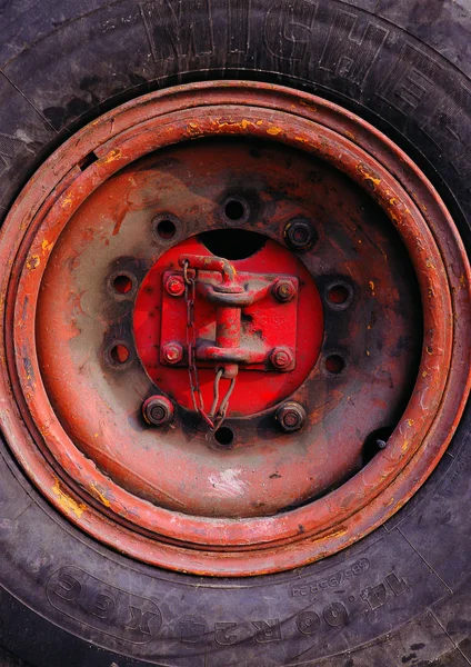 Detail of old rusty truck wheel