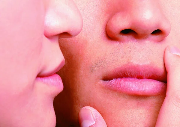 女性和男性唇的背景特写 免版税图库照片