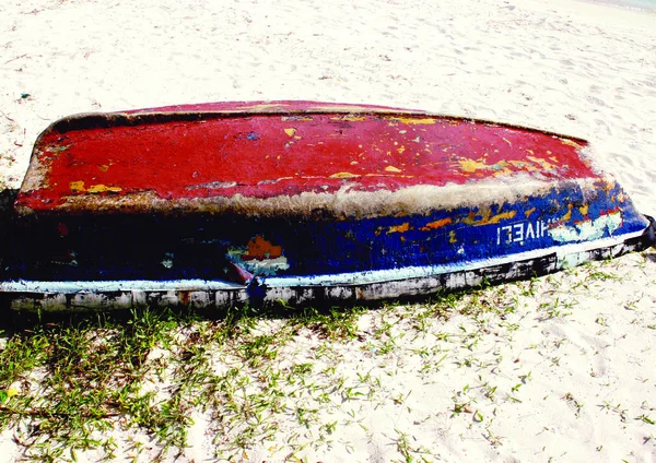 old red rusty boat on beach