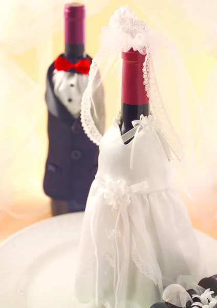 wine bottles in wedding dresses