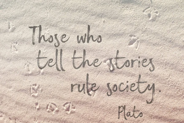 Those who tell the stories rule society - Plato quote on wavy sand surface