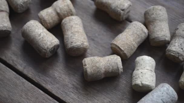 Champagne corks on wood — Stock Video