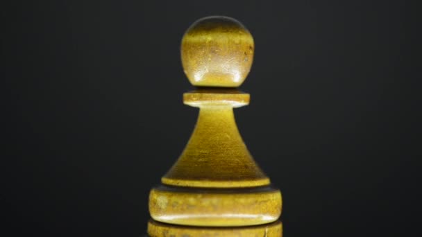 Rotating wooden pawn — Stock Video