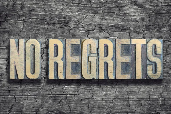 Regrets Phrase Made Vintage Letterpress Type Burned Wood Background — Stock Photo, Image