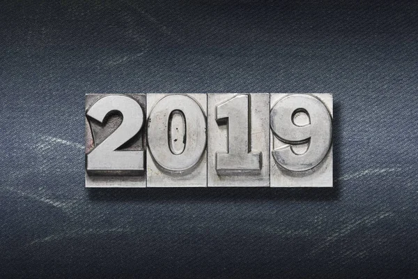 2019 Numbers Made Metallic Letterpress Dark Jeans Background — Stock Photo, Image