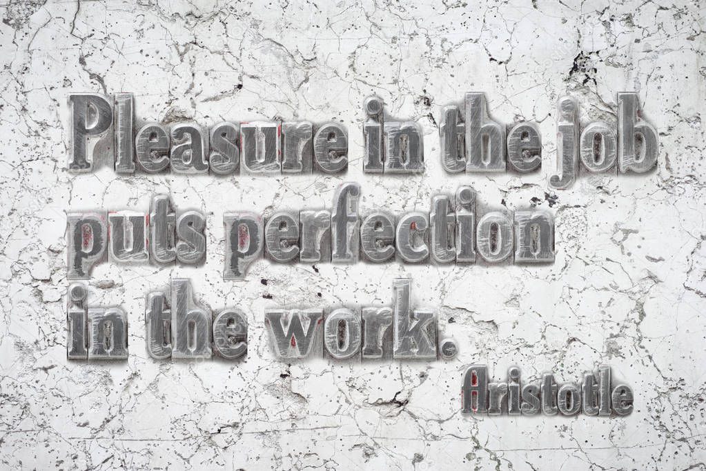 Pleasure in the job - ancient Greek philosopher Aristotle quote mounted on white marble wall