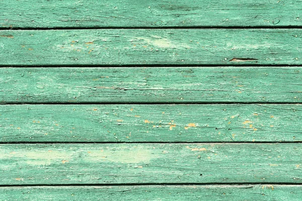 eski püskü boya plakalar ile eski yeşil ahşap arka plan