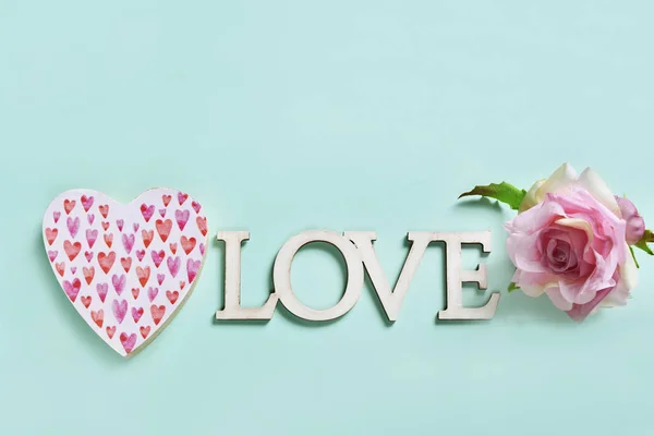 Love Concept Background Wooden Heart Letters Rose Flower Mint Color — стоковое фото