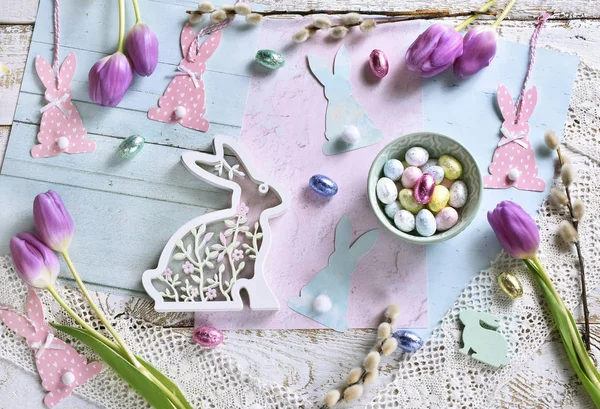 Pastel color easter flat lay with tulips eggs and bunnies — Stock Photo, Image