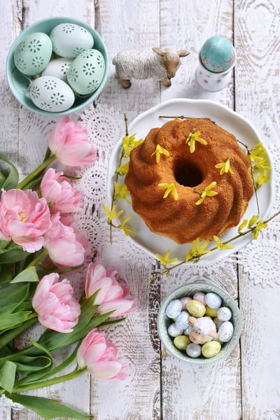 Top view on easter festive table with traditional ring cake and — Stock Photo, Image