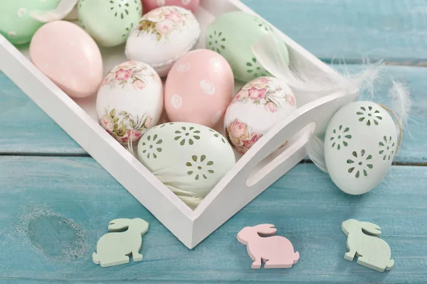 Easter background with colorful eggs on wooden planks — Stock Photo, Image