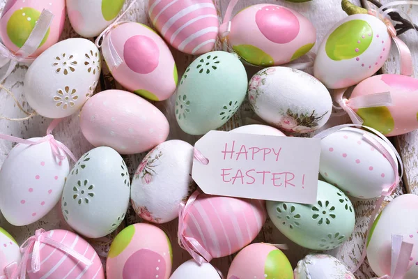 Easter background with colorful eggs and greetings — Stock Photo, Image