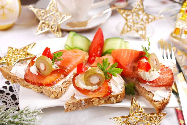 Christmas canapes with salmon and cheese — Stock Photo, Image