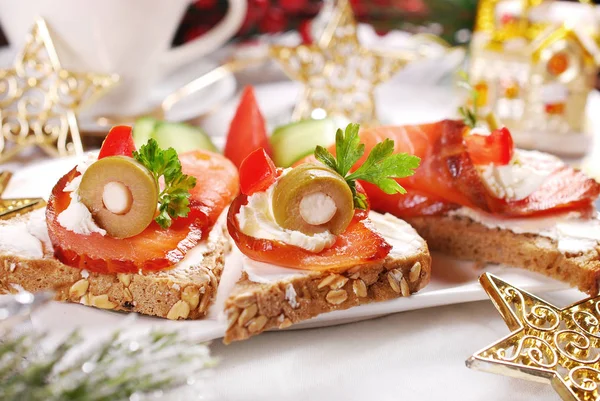 Christmas canapes with salmon and cheese — Stock Photo, Image