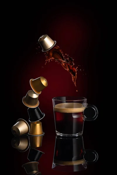 Cup Coffee Falling Containers Dark Background Stock Picture