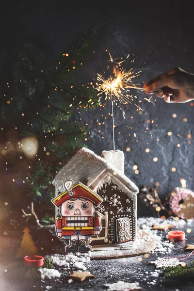 Cropped Image Woman Lighting Sparkler Gingerbread House Table New Year Stock Photo