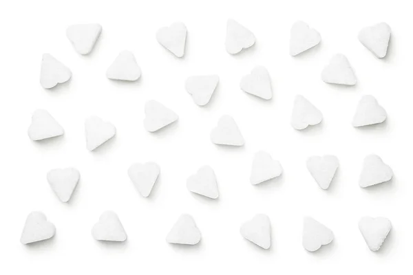 Kostki cukru w kształcie serca na białym tle — Zdjęcie stockowe