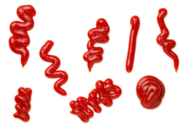 Ketchup spritzt vereinzelt auf weißem Hintergrund — Stockfoto