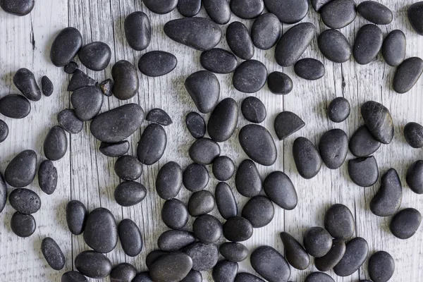 Schwarze Flussfelsen — Stockfoto