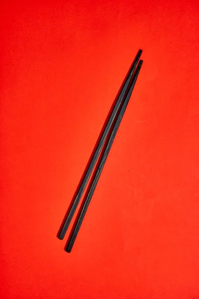 A studio photo of chop sticks