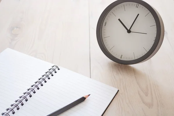 A studio photo of a desk clock