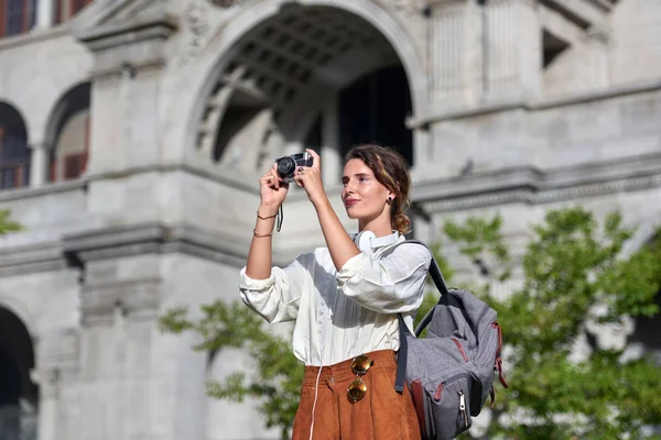 Woman Taking Pictures While Traveling Vacation Stock Image