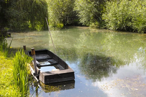 Small boat in marshes in Bourges — Stock Photo, Image