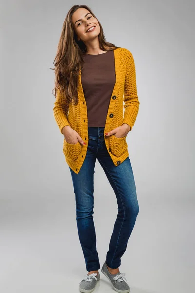 Beautiful Confident Young Woman Gray Background Studio Weaning Yellow Cardigan — Stock Photo, Image