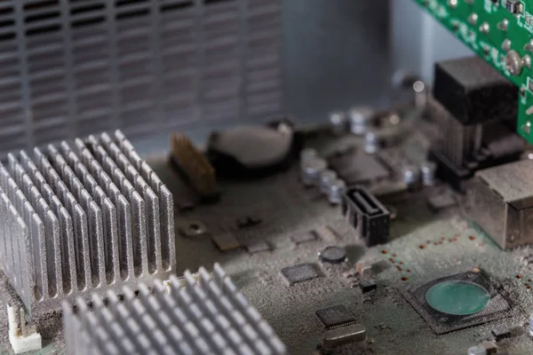 dusty pc electronic hardware closeup with selective focus and blur