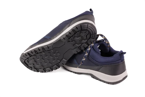 黑色和蓝色的户外空的轻质防水透气面料运动鞋隔离在白色的背景 — 图库照片