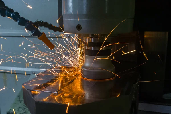 Heavy milling of thick hardened plate with sparks under air blow