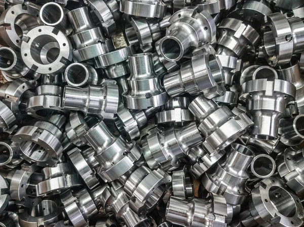 Shiny metal parts background with selective focus. Factory new condition. — Stock Photo, Image