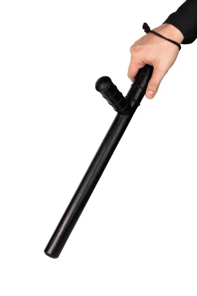 Hand in black shirt with black rubber police baton isolated on white background — Stock Photo, Image