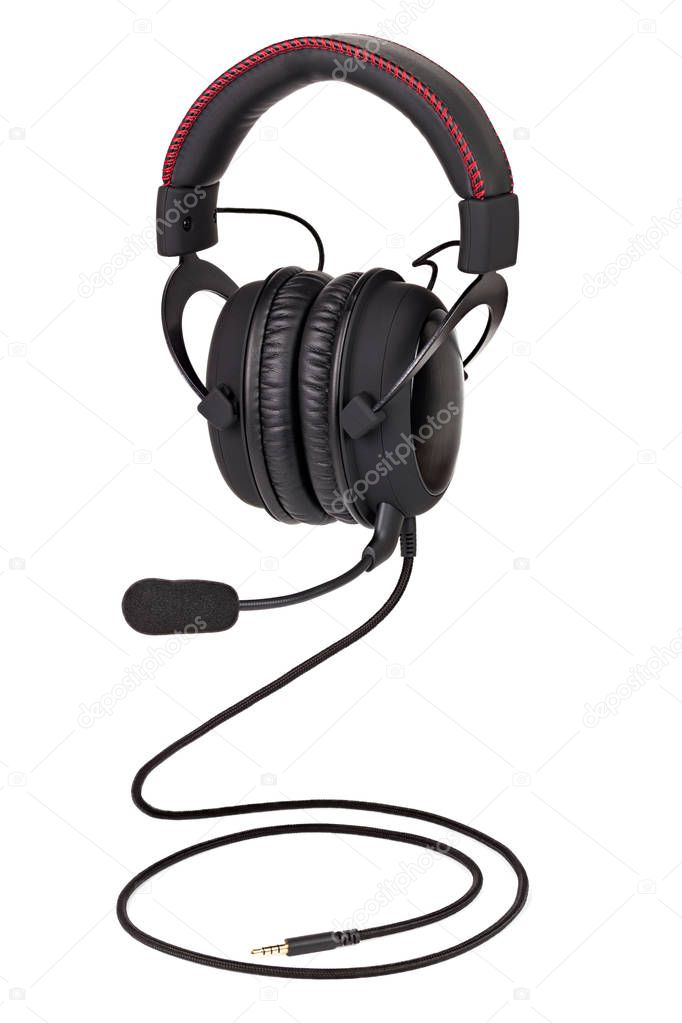 wired black gaming headphones with microphone isolated on white background