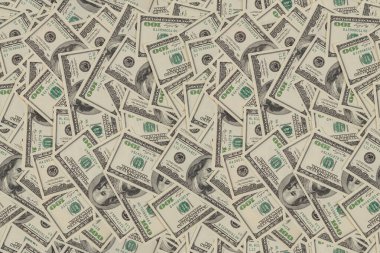 Düz dokular ve gerçek 100 Amerikan dolarının arka planı.