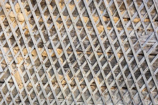 Wattle e daub edifício parede textura e fundo sob luz solar direta durante o dia — Fotografia de Stock