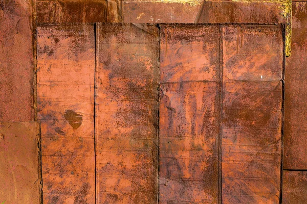rusted tin sheets patchwork wall texture and flat background